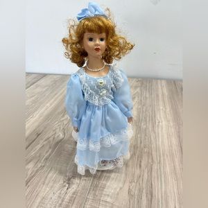 Vintage porcelain doll- 16”